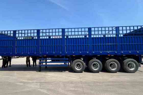 4 Axle Fence-Type Cargo Semi-Trailer with 80 Tons Payload and Heavy-Duty Mechanical Spring Suspension